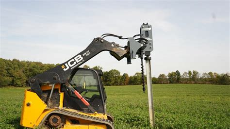 skid steer pile driver|vibrating post driver skid steer.